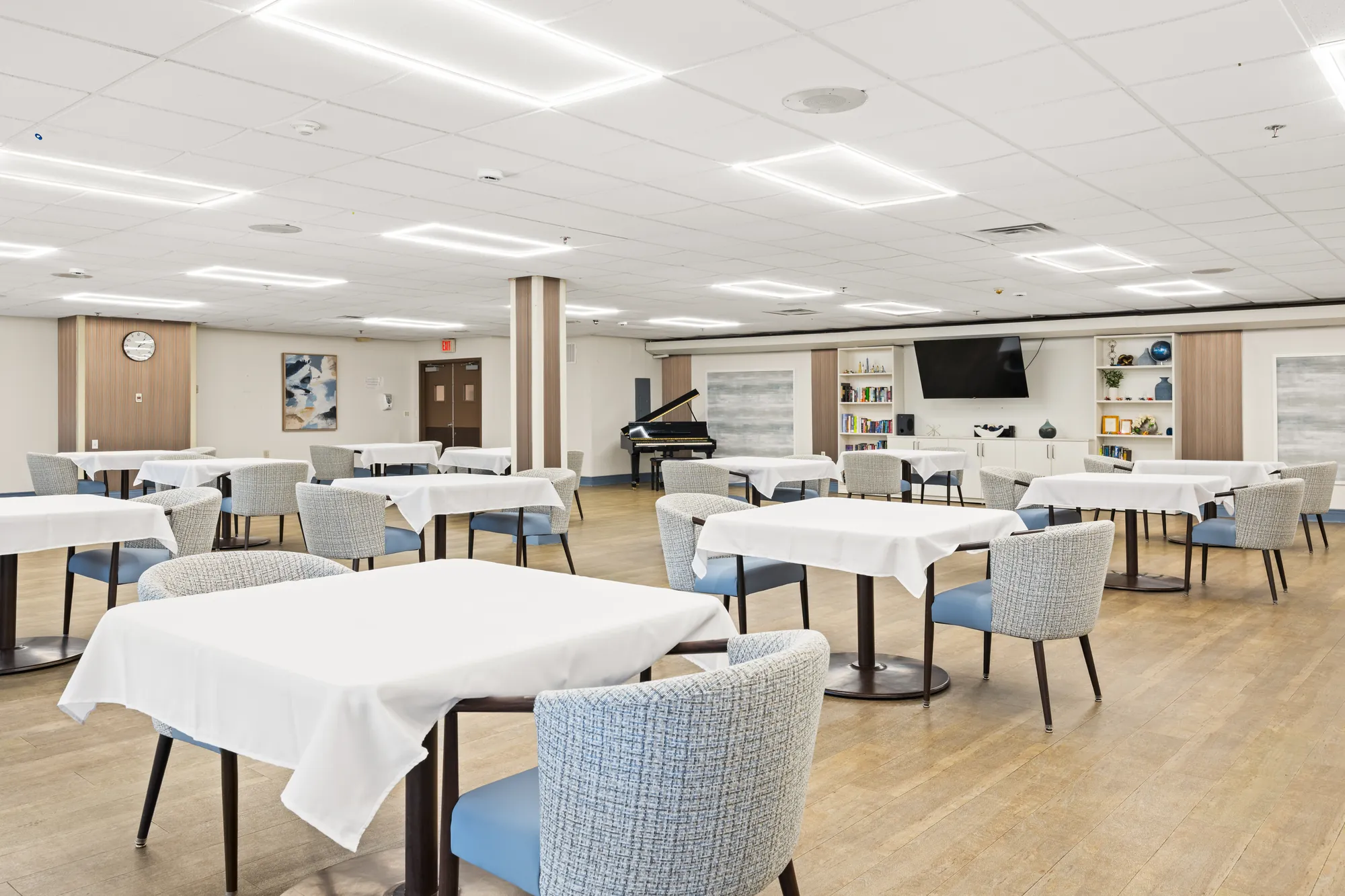 The Amara dining room, empty and set, photographed for the dining page