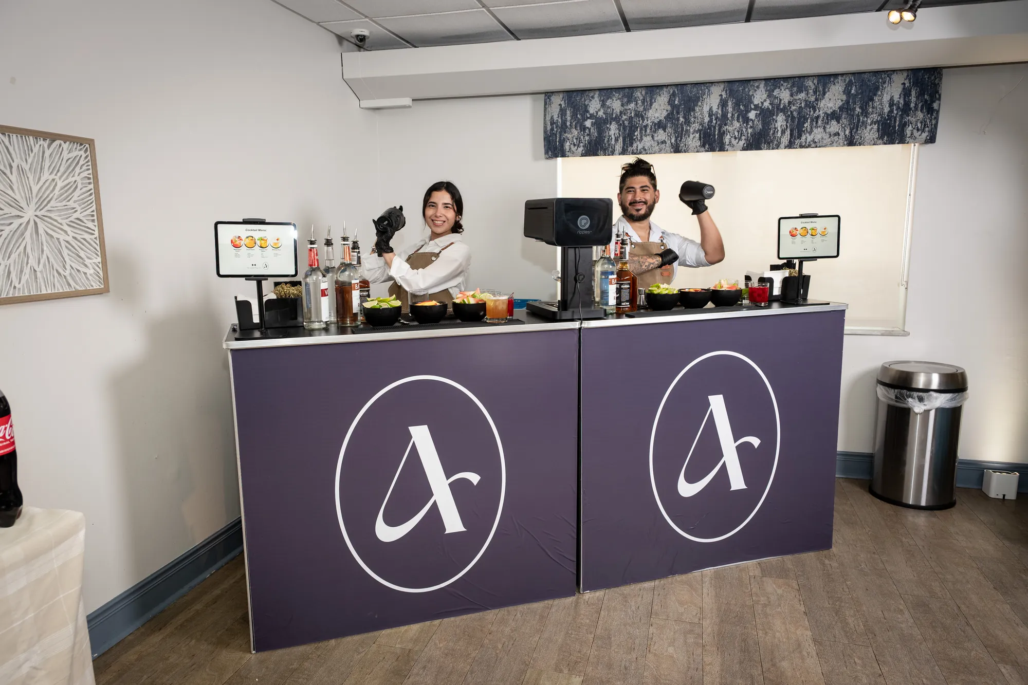The branded reception and catering counter at the Amara open house