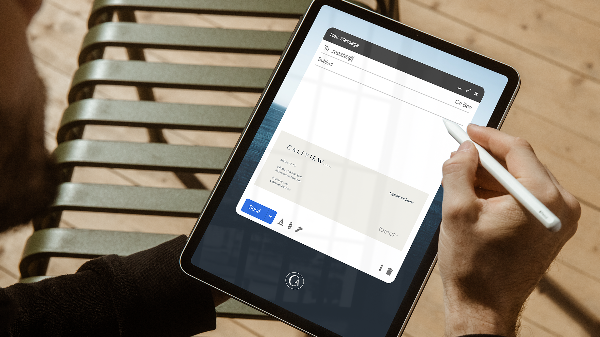 Tablet showing an email draft with the Caliview Estates signature block