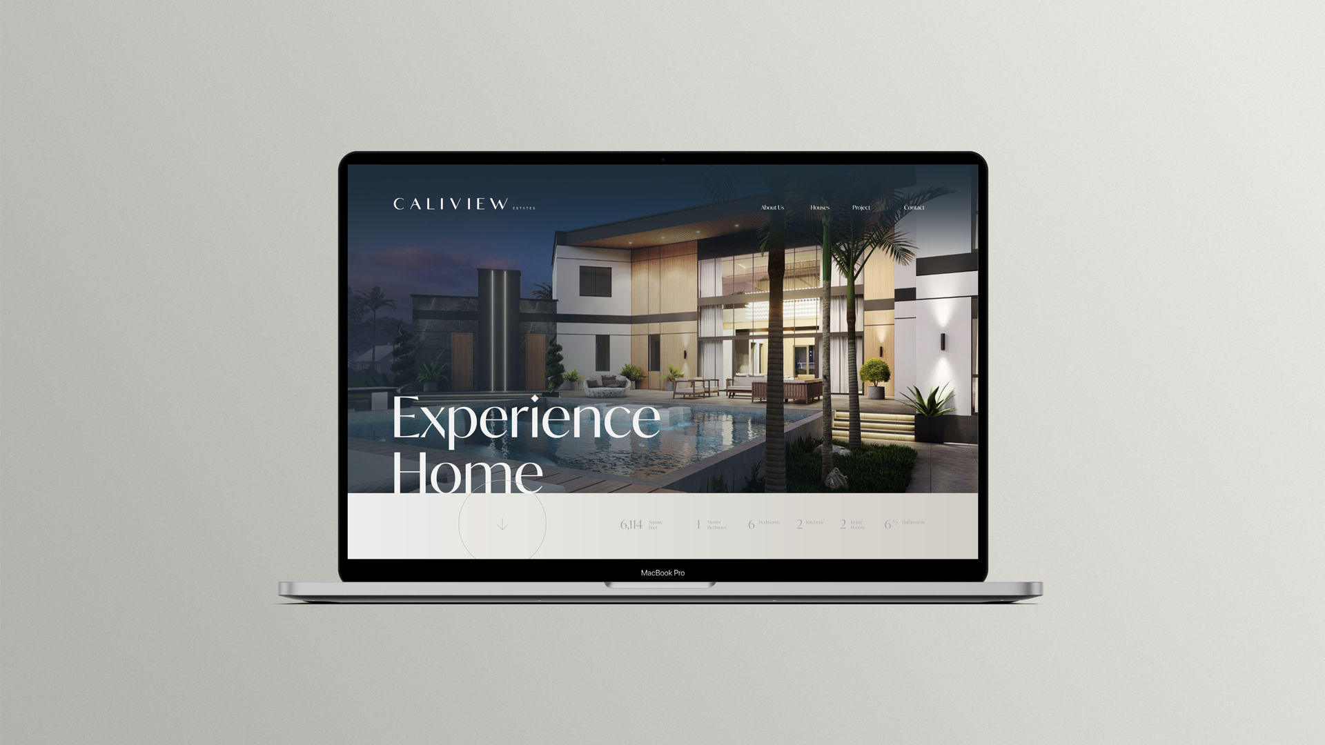 Laptop showing the Caliview Estates website with the headline Experience Home