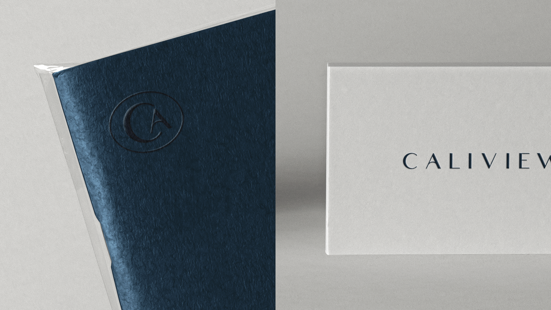 Close-up of the embossed CA monogram on a navy folder and the wordmark on a white box