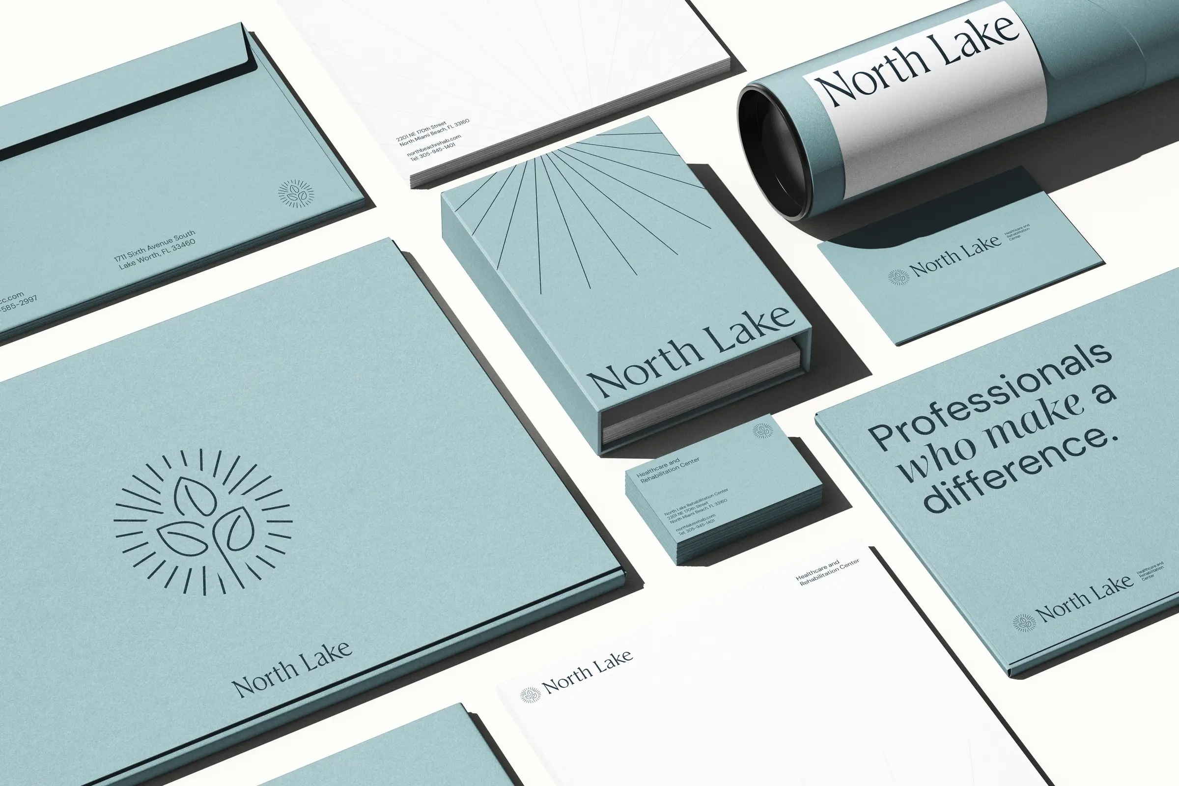 Palmetto stationery system in terracotta, including envelopes, letterhead, folders, and business cards
