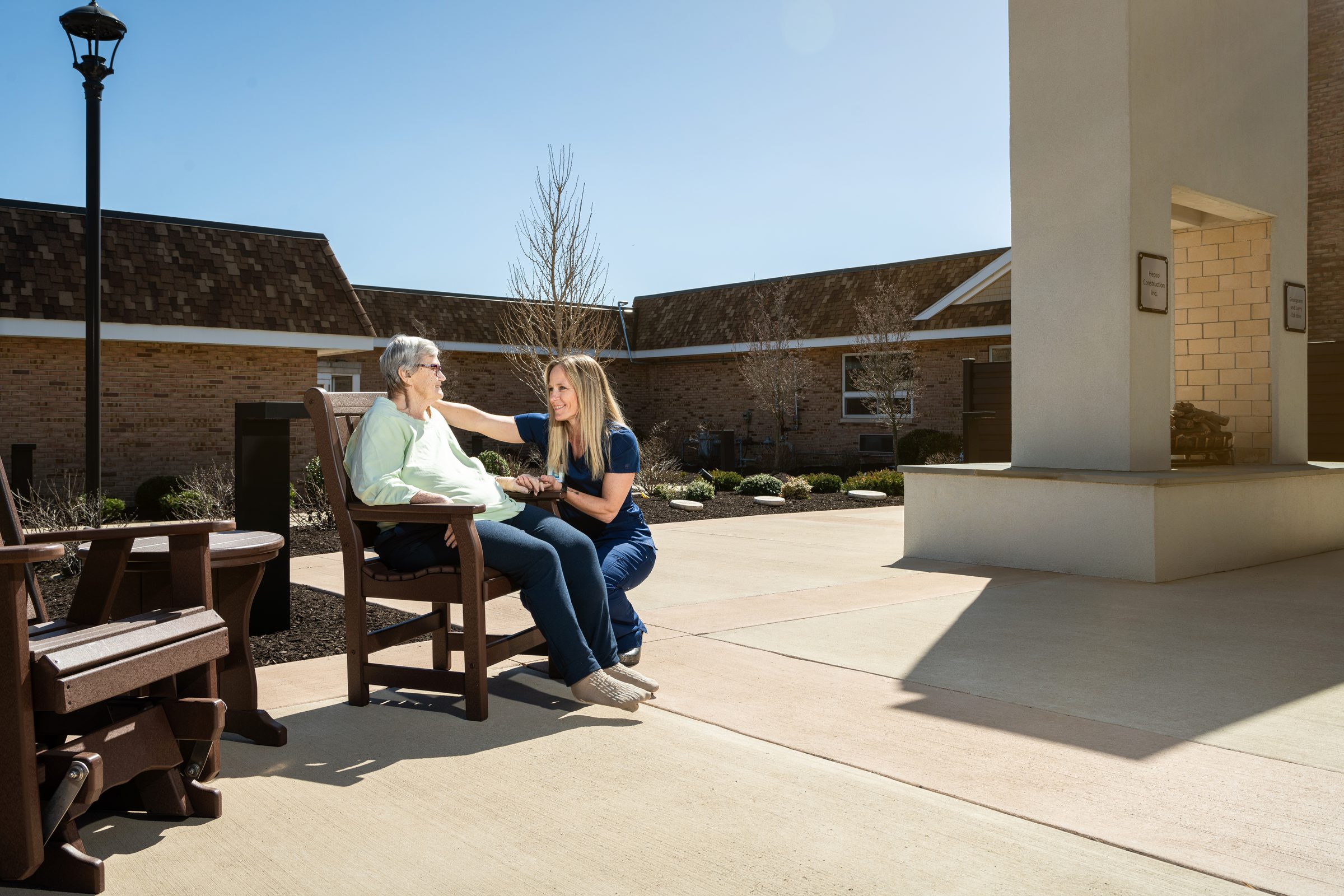 Resident working through balance training with Oak Glen therapy team