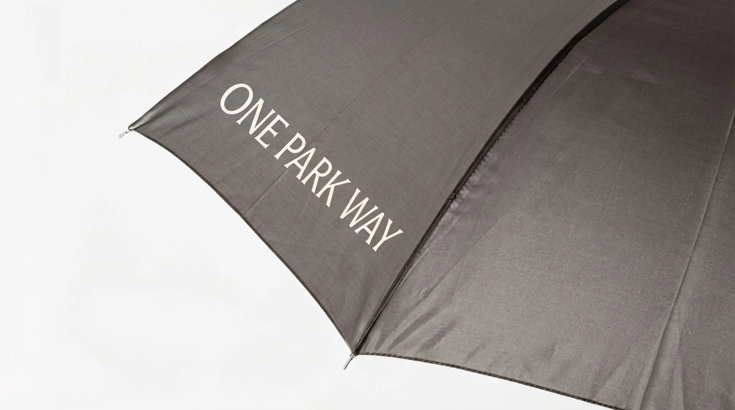 One Park Way black branded umbrella