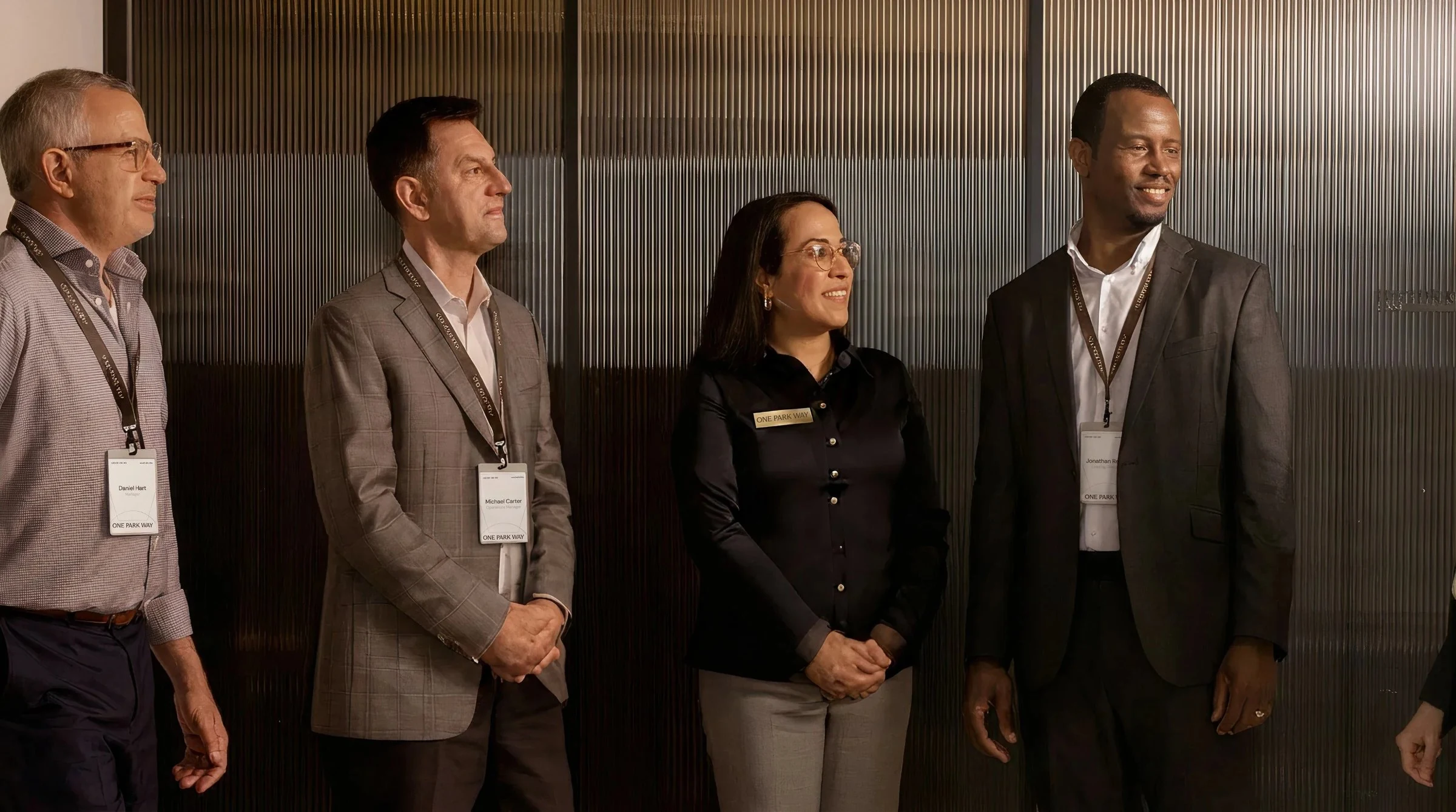 One Park Way property team in branded lanyards and name badges
