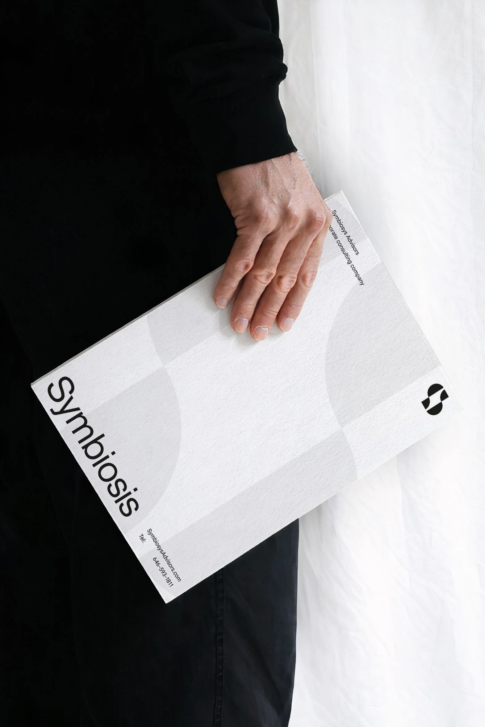 Symbiosis Advisors corporate folder, held