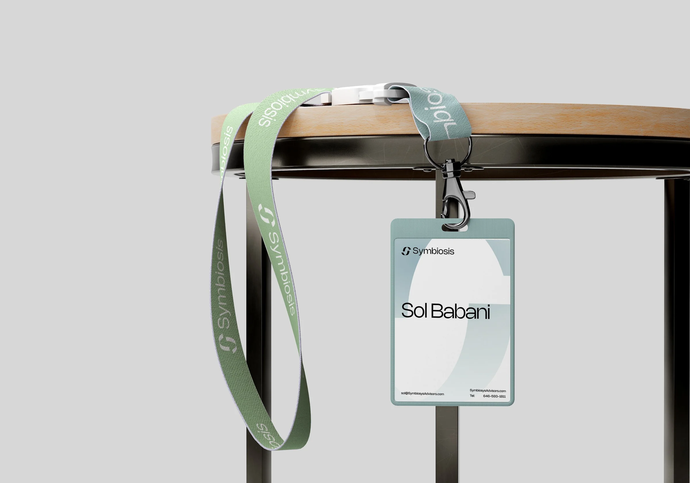 Symbiosis Advisors lanyard and ID badge