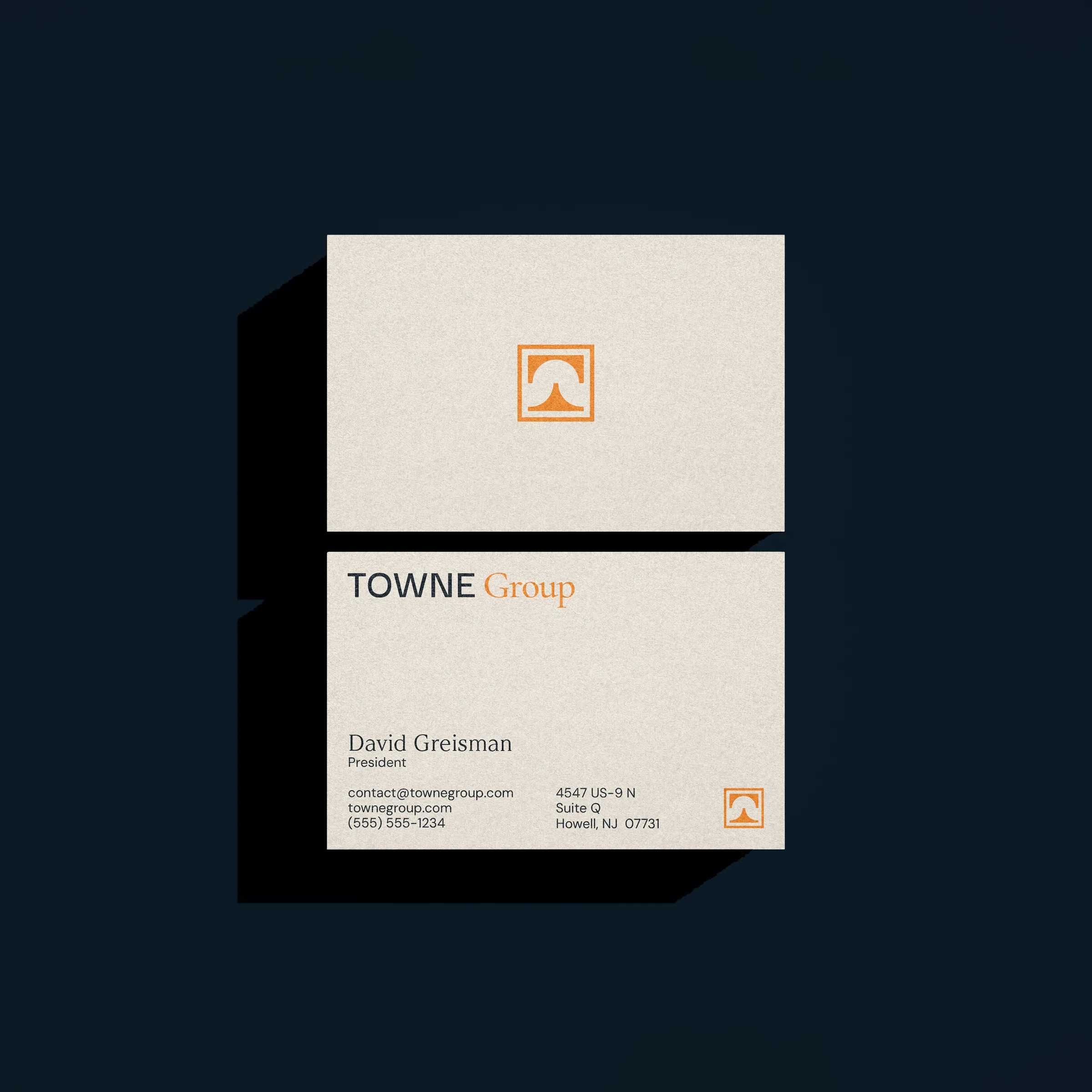Towne Group business card, front and back, with the orange square mark on textured stock