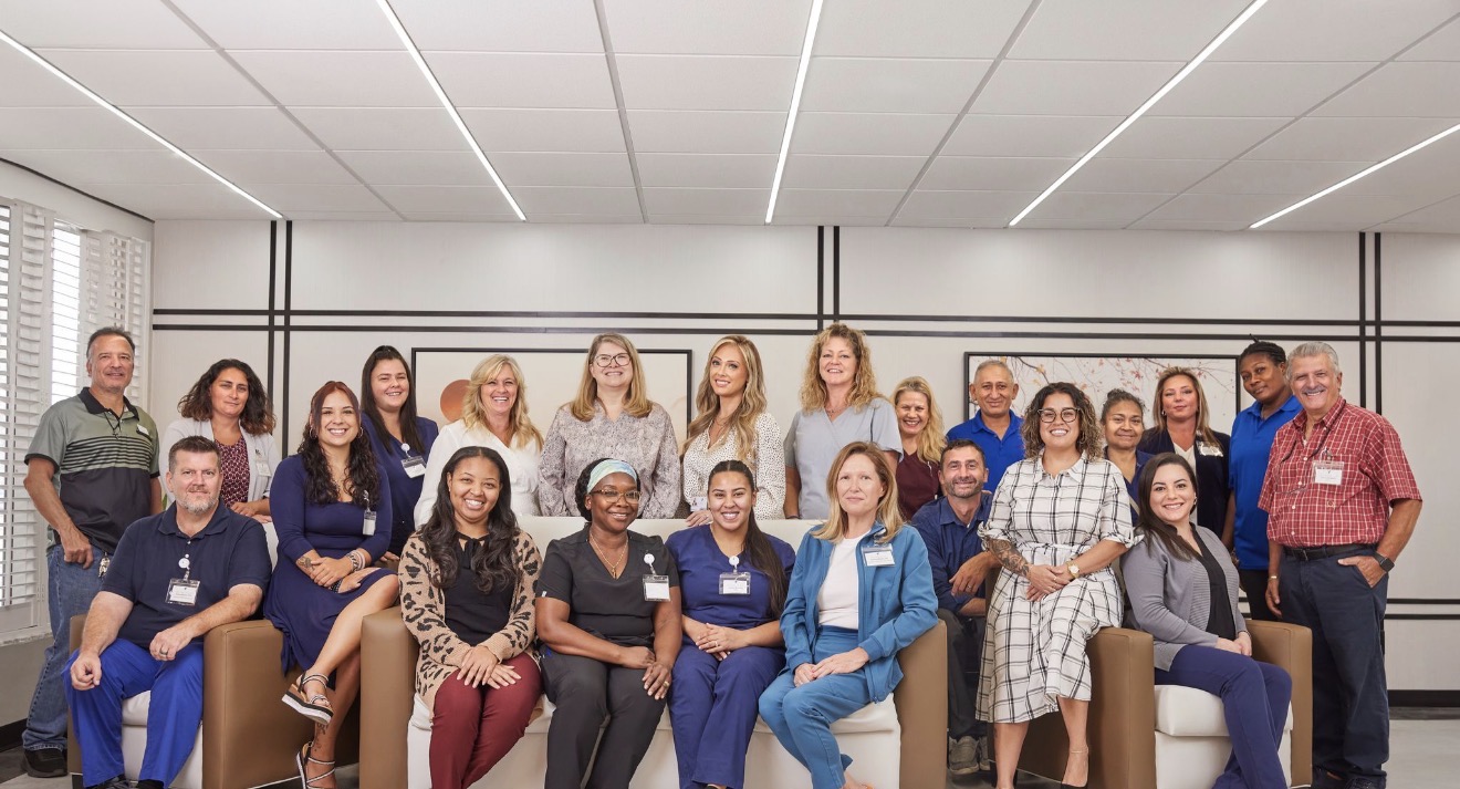 The full Village Place staff portrait, nurses, aides, therapists, leadership