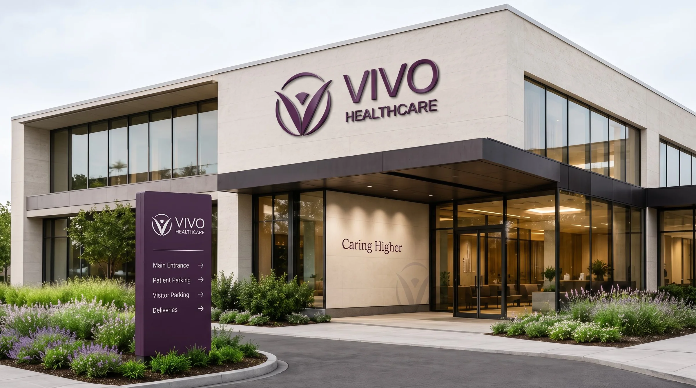 Vivo Healthcare building entrance with the wordmark on the facade, a purple wayfinding pylon, and Caring Higher above the doors