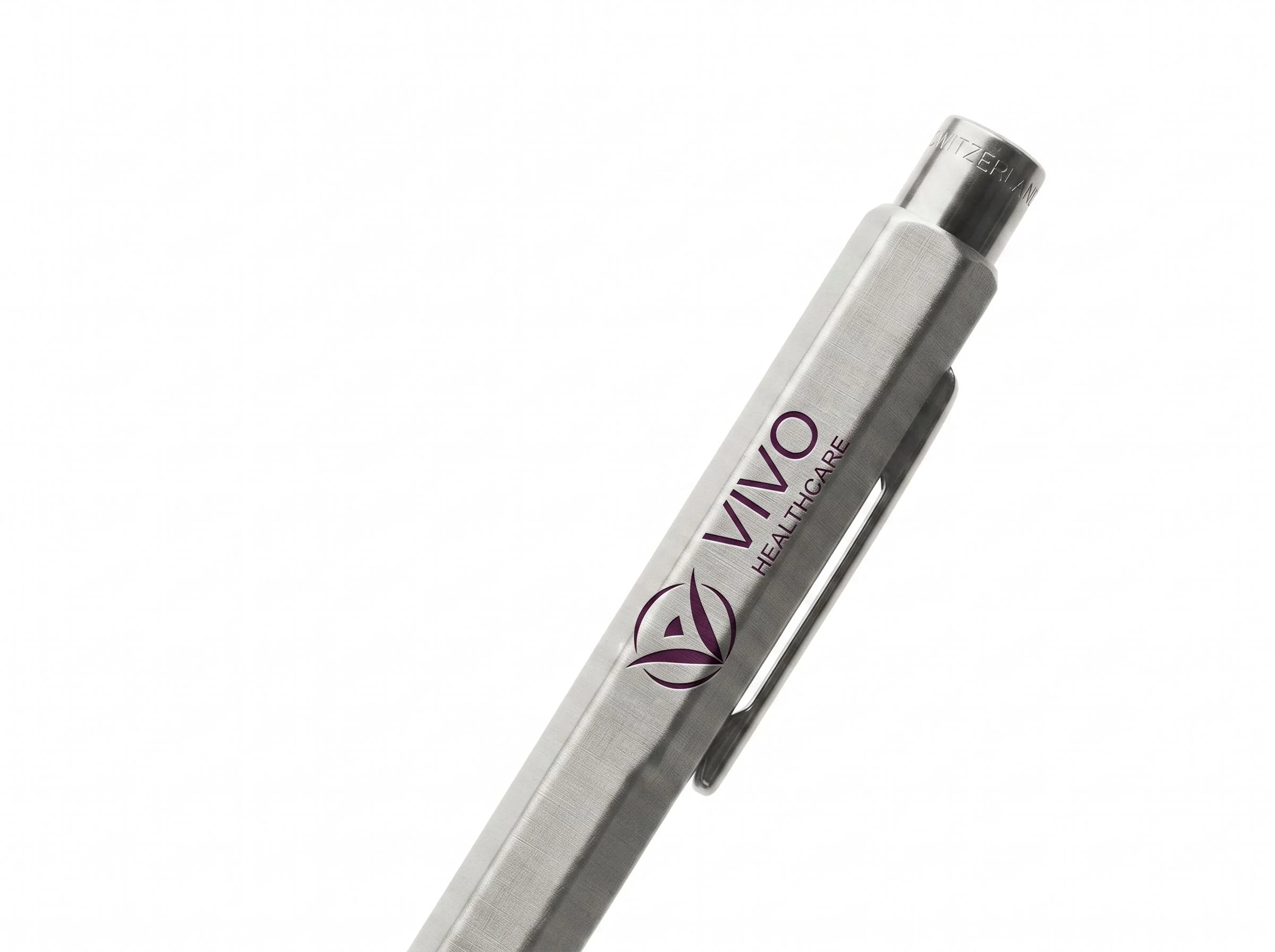 A brushed metal pen printed with the Vivo Healthcare logo