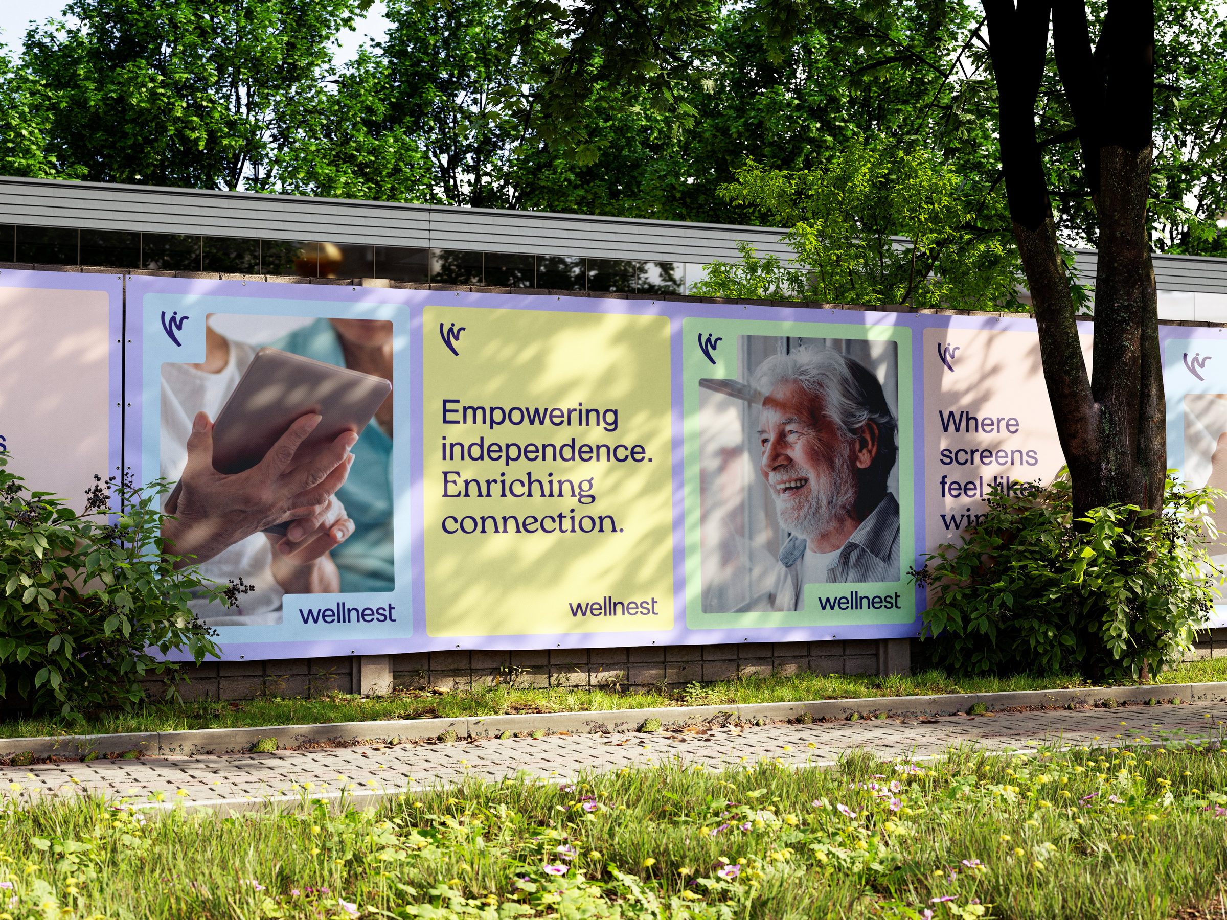 Wellnest billboard run on a streetside fence with three campaign panels